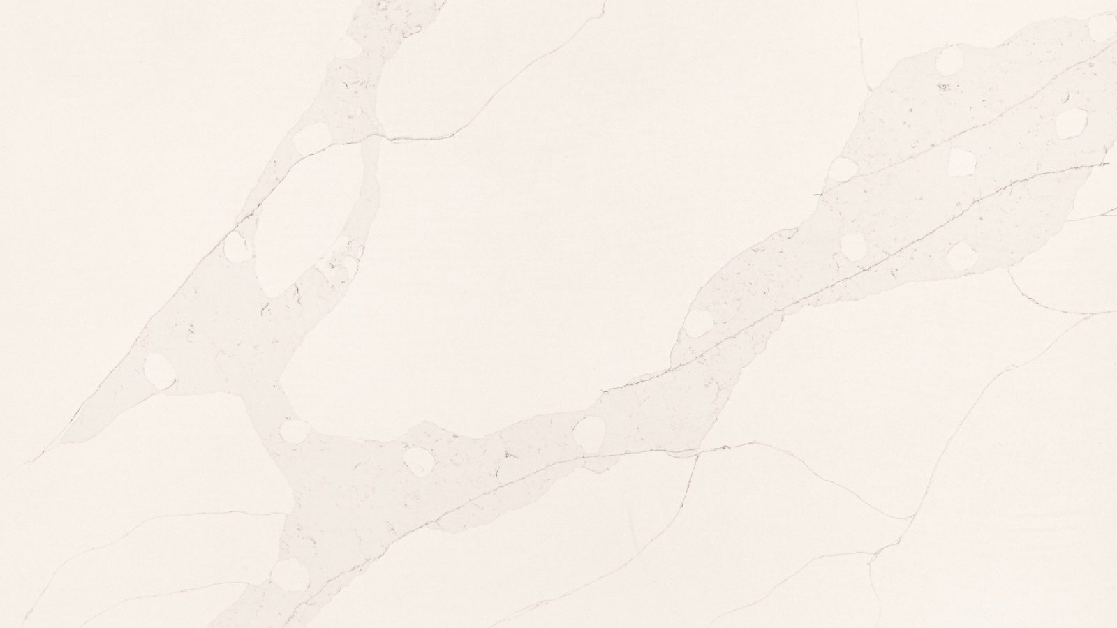 Close detail of the veining in Antique Calacatta polished quartz