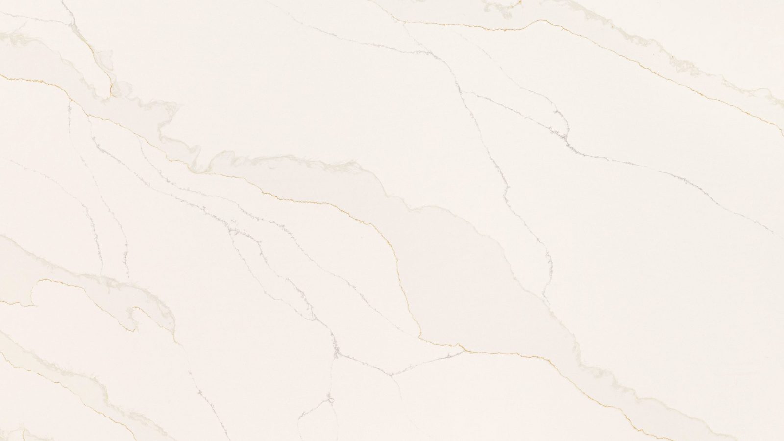 Close detail of the veining in Calacatta Imperial Gold polished quartz