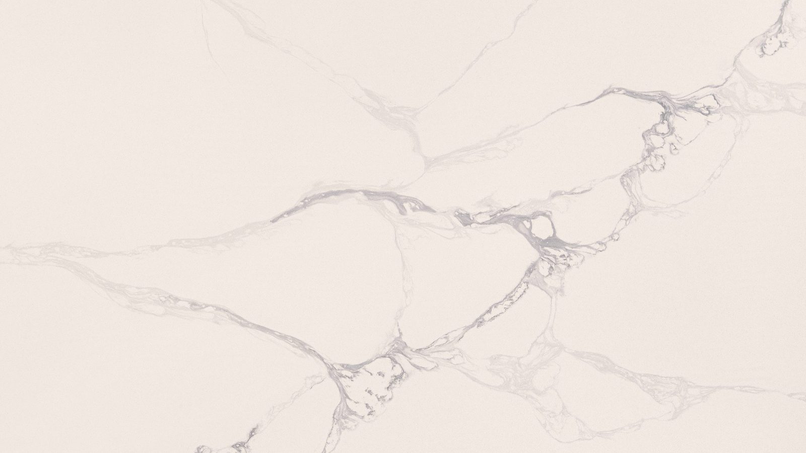 Close detail of the veining in Calacatta Skycrest polished quartz