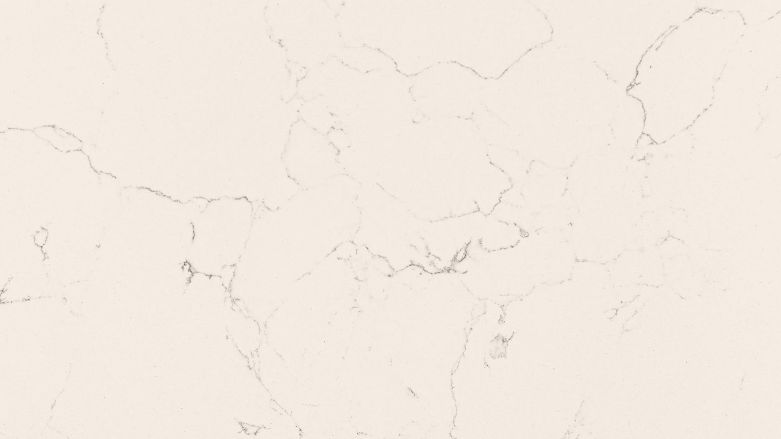 Close detail of the veining in Delicate Carrara polished quartz