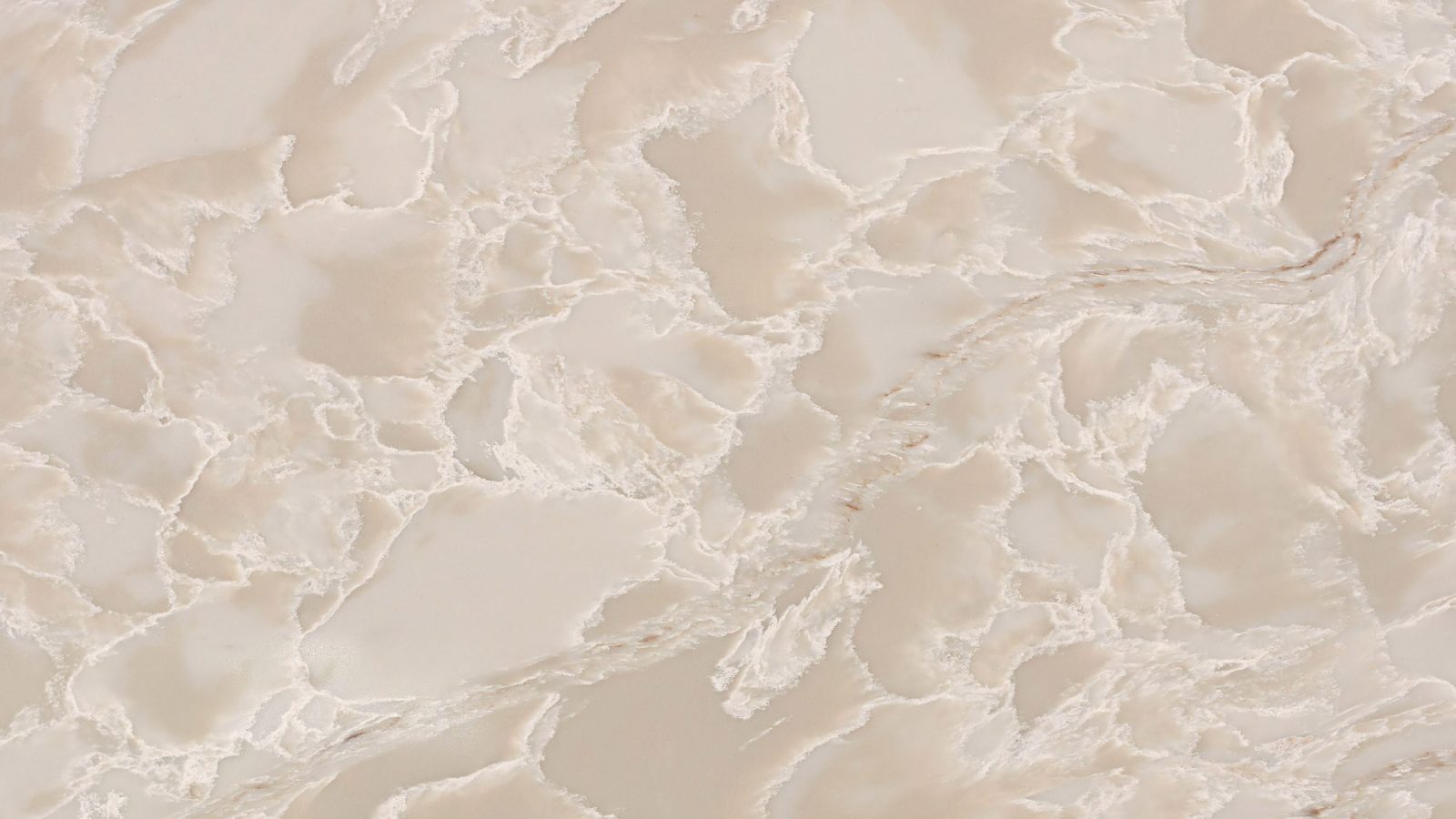 Close detail of the veining in Taj Gold Summit polished quartz